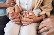 © Allistair F/peopleimages.com - Holding hands, support and love with trust, help and comfort people with empathy and care with grief. Parents helping adult child, connection and solidarity with relationship, commitment and zoom