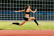 triple jump women jumper athlete on stadium