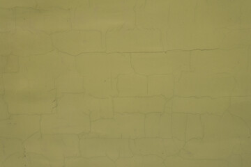 Wall Mural - Texture of greenish yellow painted wall with cracks