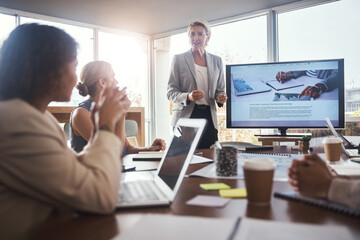 Poster - Business, woman and leader with presentation with staff, brainstorming and planning for company growth, sales or conversation. Female speaker, group or presenter with motivation or corporate training