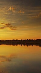 Wall Mural - beautiful landscape with sunset over river, timelapse. vertical video