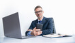 © be free - busy businessman in eyewear using phone in office with laptop