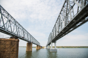 Wall Mural - Large metal railway bridge across the river