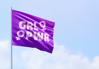 Wall Mural - Purple GRL PWR flag on a blue sky and copy space for international women's day and feminist activism in 3D illustration. March 8 for independence, empowerment, and activism for women rights