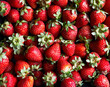 © ADDICTIVE STOCK - Pile of fresh strawberries as background
