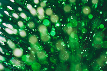 Abstract Background Of Green Sparkles
