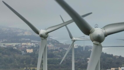 Sticker - Wind turbine on the top of the mountain by the sea