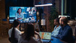 © DC Studio - Remote team attending videocall meeting, coworkers talking on videoconference at night. Diverse people chatting in teleconference, colleagues brainstorming ideas in videoconference in office zoom in