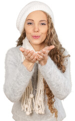 Wall Mural - Portrait of beautiful young woman  blowing snow in winter clothes