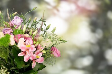 Fresh spring flowers bouquet on light background