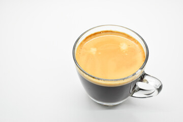 Wall Mural - hot black coffee put on white table background