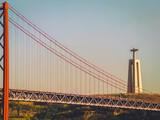 Fototapeta Młodzieżowe - Lisbon: 25 de Abril Bridge and Christ the King