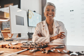 Sticker - Senior optometrist woman, portrait and office with glasses, smile or frame design planning at desk. Happy optician, spectacle designer and excited face in workplace for pride, small business and goal