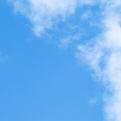Wall Mural - background of blue sky with white clouds