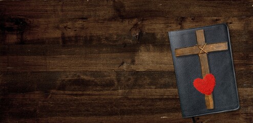 Poster - Holy Bible book on the wooden table with Cross