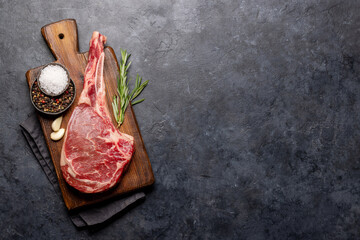 Canvas Print - Raw Tomahawk beef steak and spices