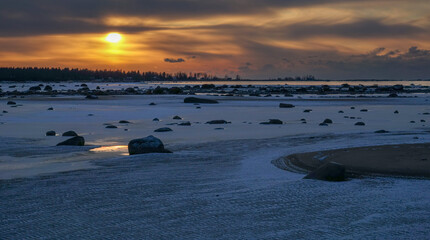 Wall Mural - Winter view of a icy and snowy seashore.
