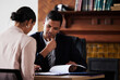 © Courtney/peopleimages.com - Legal, signature and contract with people planning on documents for partnership, b2b and agreement. Lawyer, financial advisor and consulting with man and woman for writing, deal and divorce review