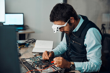 Poster - Technician, computer and engineer repair motherboard, microcircuit or electronic device in a workshop or shop. Person, man and guy fixing hardware with electric meter for technology in a lab