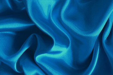 Blue fabric cloth texture for background and design art work, beautiful crumpled pattern of silk or linen.