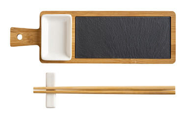 Wall Mural - Bamboo sushi serving set cutout. Wooden board with black slate tray, porcelain soy sauce dish and pair of chopsticks on a rest isolated on a white background. East Asian tableware.