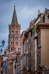 Wall Mural - View on Saint Sernin Basilica bell tower from a street in Toulouse old town (South of France)