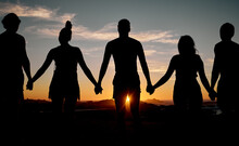 Friends, Bonding Or Holding Hands On Sunset Beach Silhouette, Nature Freedom Or Community Trust Support. Men, Women Or People Sunrise Shadow In Solidarity, Team Building Help Or Travel Mission Goals