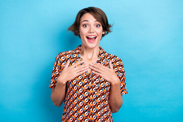 Poster - Photo of impressed funny lady dressed print shirt arms chest smiling open mouth isolated blue color background