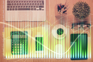 Poster - Double exposure of forex chart hologram over desktop with phone. Top view. Mobile trade platform concept.