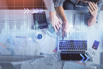 Poster - Double exposure of man and woman working together and financial graph hologram drawing. market analysis concept. Computer background. Top View.