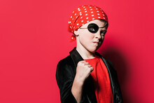 Confident Boy In Pirate Outfit Showing Fist
