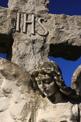 Wall Mural - stone sculpture of a sad angel