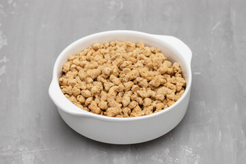 Poster - dry uncooked soya in white small bowl