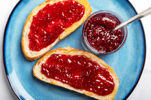 Open Sandwich With Toasted Sourdough White Bread Slices And Raspberry Jam