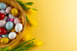 Image of multi coloured easter eggs in basket with yellow tulips and copy space on yellow background
