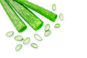 Wall Mural - Green aloe vera leaves has water drop and slice isolated on white background. beauty skin care concept , top view , flat lay.