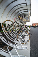 Wall Mural - Spherical public bicycle parking for fans of active and ecological way of transportation on the waterfront in Boston