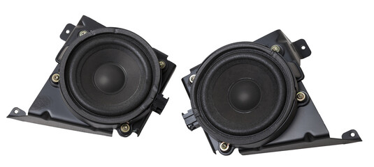 Two speakers of an acoustic system - an audio for playing music in a car interior on a white isolated background in a photo studio. Spare parts for auto repair in a workshop or for sale for tuning