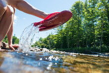 Pink Flip Flops In The River