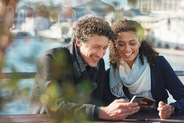 Poster - Couple, phone and talking outdoor for travel, communication and 5g network connection on a bridge. Happy interracial man and woman together on vacation with a smartphone for location internet search