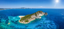 Aerial Panorama Of The Beautiful Island Of Marathonisi Or Turtle Island In The Bay Of Laganas With Turquoise Sea And Sand Beaches, Zakynthos, Greece