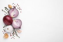 Fresh Red Onions, Garlic, Thyme And Spices On White Background, Flat Lay. Space For Text