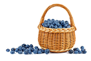 Wall Mural - Blueberry in wicker basket isolated on a white background