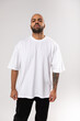 © kanashkin - African american man in white t-shirt.. Mock-up.