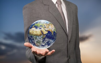 Sticker - Business person hold a world Globe.