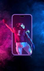 American football player. Sports betting on american football. Sportsman with ball in helmet on stadium in action. Bets in the mobile application.