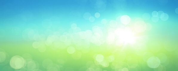 Poster - Calming fresh spring abstract background with round bokeh and sun glow. Blue and green colour computer graphic.