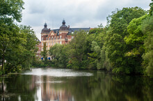 Military Building Fortifications And Barracks In A Park By The River In The City Of Copenhagen, Denmark