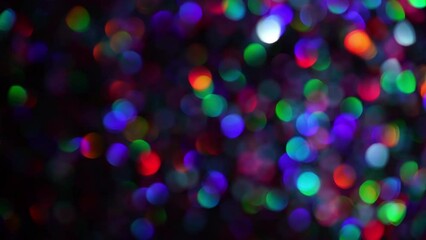 Wall Mural - Small Blur Neon Lights transition. Bokeh Blur Circles Shimmering On Dark. Amazing Lens Flares Light Leaks and Bokeh Motion Effect. 4k animated background or overlay. Multicolored Blur Lights Glowing.
