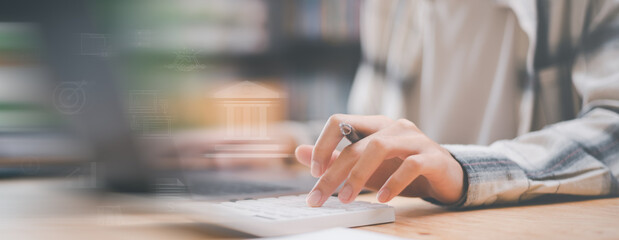 Aufkleber - Accountant calculating numbers in company financial documents with calculator ,Analysis of company financial data ,Planning to assess and review the budget ,concept of finance and investment